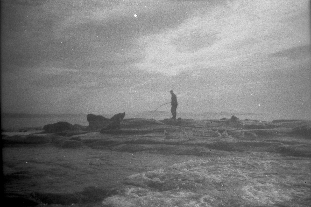 Boxing trainer Harold Harold Kindley rod fishing at Shag Point - the rods consisted of a long bambo pole